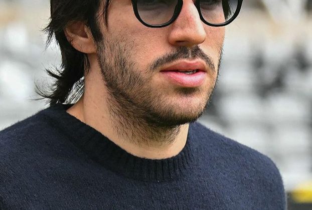 Sandro Tonali during a football match amid transfer speculation linking him with Chelsea