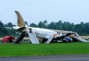 Aircraft making an emergency landing at an airport runway