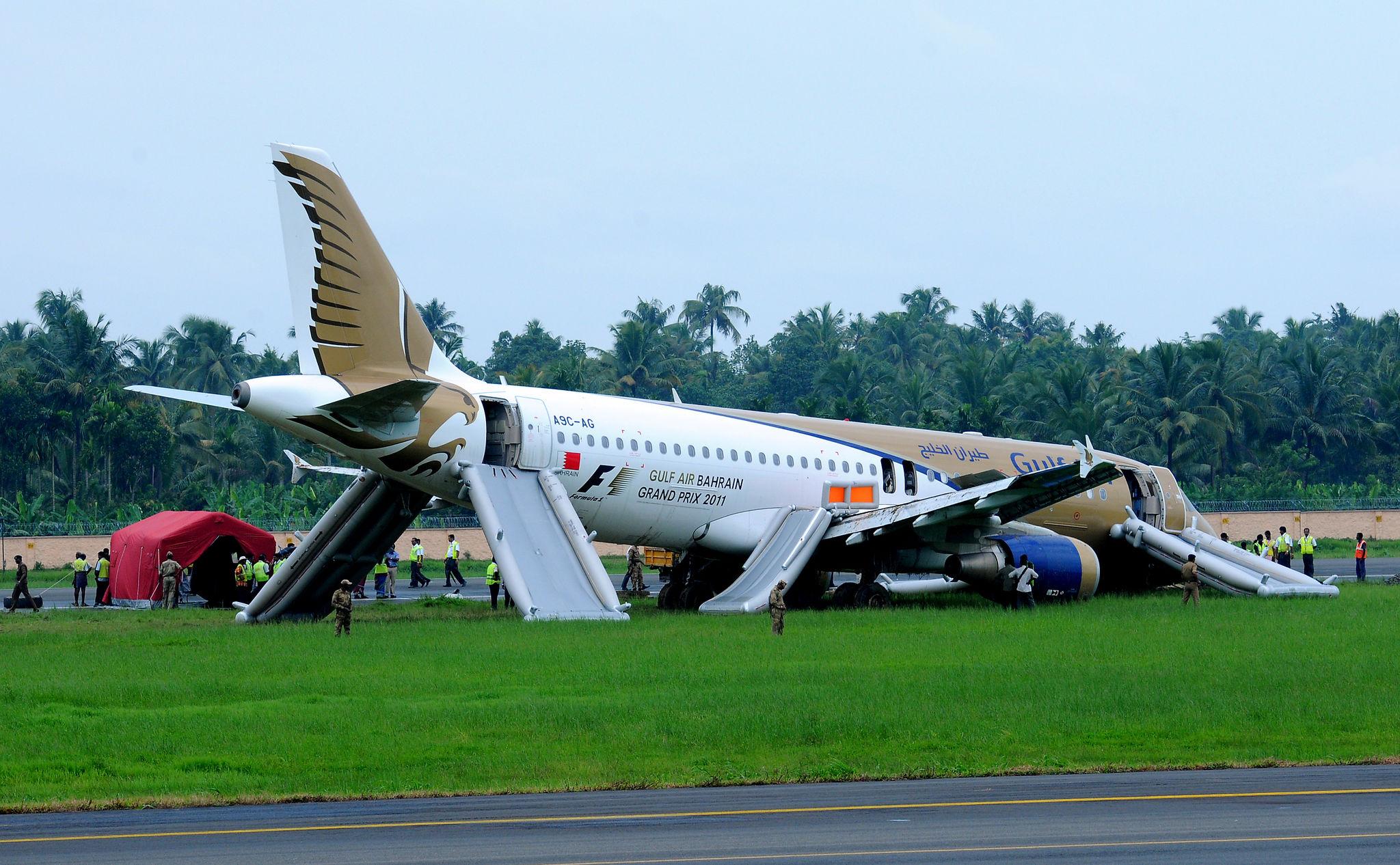 Aircraft making an emergency landing at an airport runway