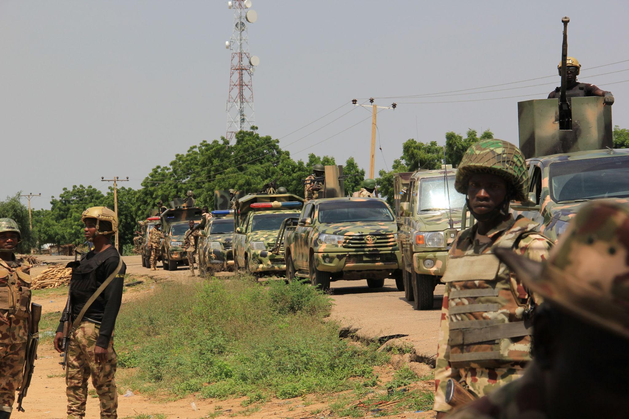 Security personnel near a secondary school in Borno State following an attack during a NECO examination